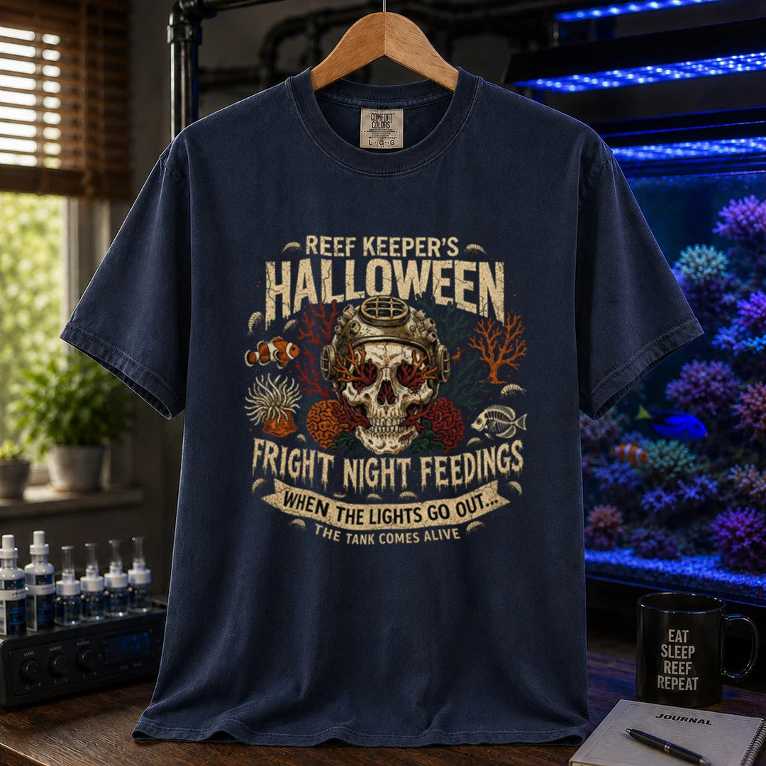 Saltwater aquarium graphic t-shirt design featuring distressed vintage typography reading Reef Keeper's Halloween Fright Night Feedings with a vintage diving helmet skull, amphipods, and a banner reading When The Lights Go Out... The Tank Comes Alive, navy crew neck tee