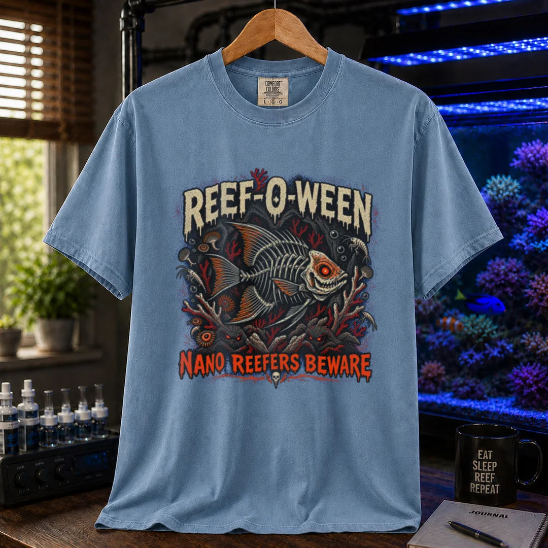 Saltwater aquarium graphic t-shirt design featuring dripping cream and orange typography reading Reef-O-Ween and Nano Reefers Beware with a glowing-eyed skeletal fish illustration and creepy corals, blue  crew neck tee