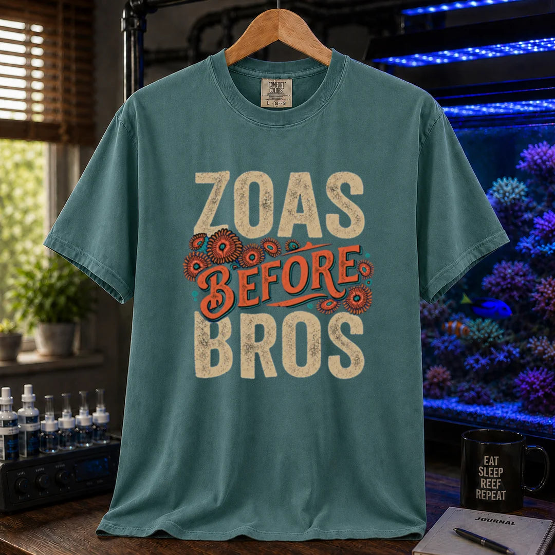 Saltwater aquarium graphic t-shirt design featuring distressed typography reading Zoas Before Bros with colorful zoanthid polyp illustrations on a green tee