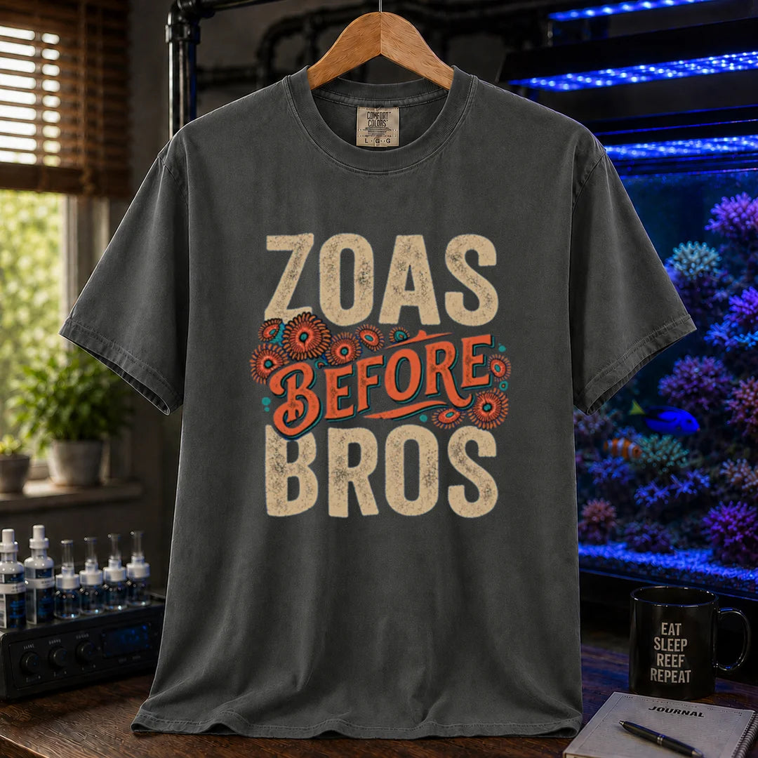 Saltwater aquarium graphic t-shirt design featuring distressed typography reading Zoas Before Bros with colorful zoanthid polyp illustrations on a dark grey tee