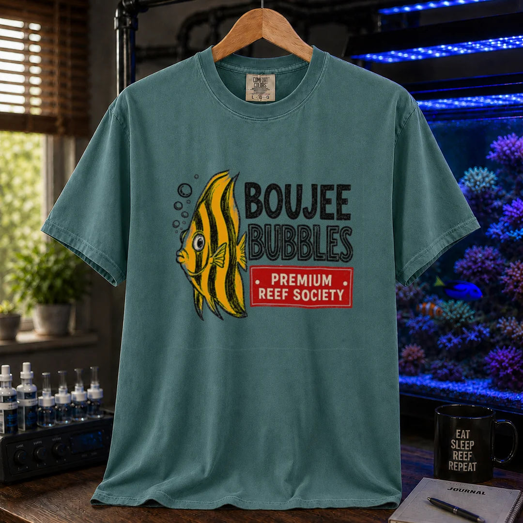 Saltwater aquarium graphic t-shirt featuring an illustration of a yellow striped fish blowing bubbles next to text reading Boujee Bubbles Premium Reef Society on a green shirt