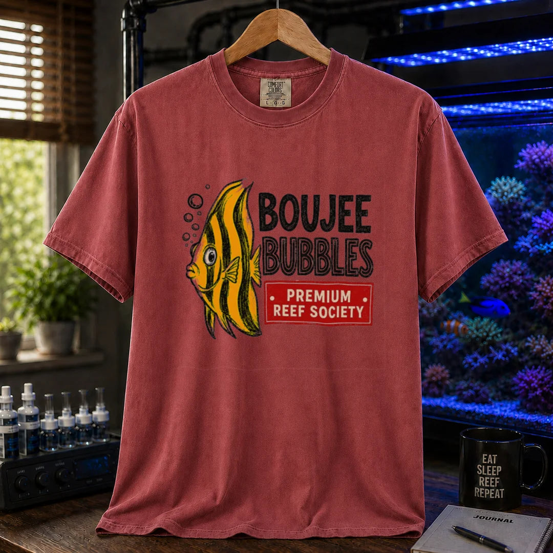 Saltwater aquarium graphic t-shirt featuring an illustration of a yellow striped fish blowing bubbles next to text reading Boujee Bubbles Premium Reef Society on a maroon, red shirt