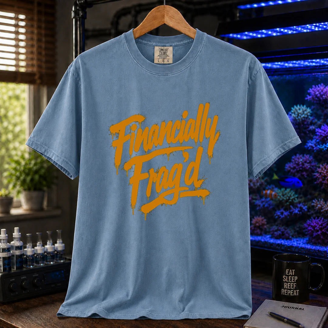 Saltwater aquarium graphic t-shirt featuring vibrant yellow graffiti-style spray paint lettering reading Financially Frag'd on a blue shirt