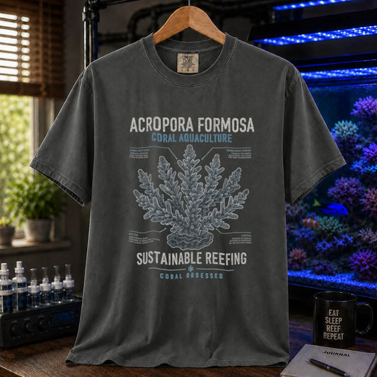 Saltwater aquarium graphic t-shirt featuring scientific illustration of an acropora coral colony with technical callout labels and text reading Acropora Formosa Coral Aquaculture on a dark grey shirt