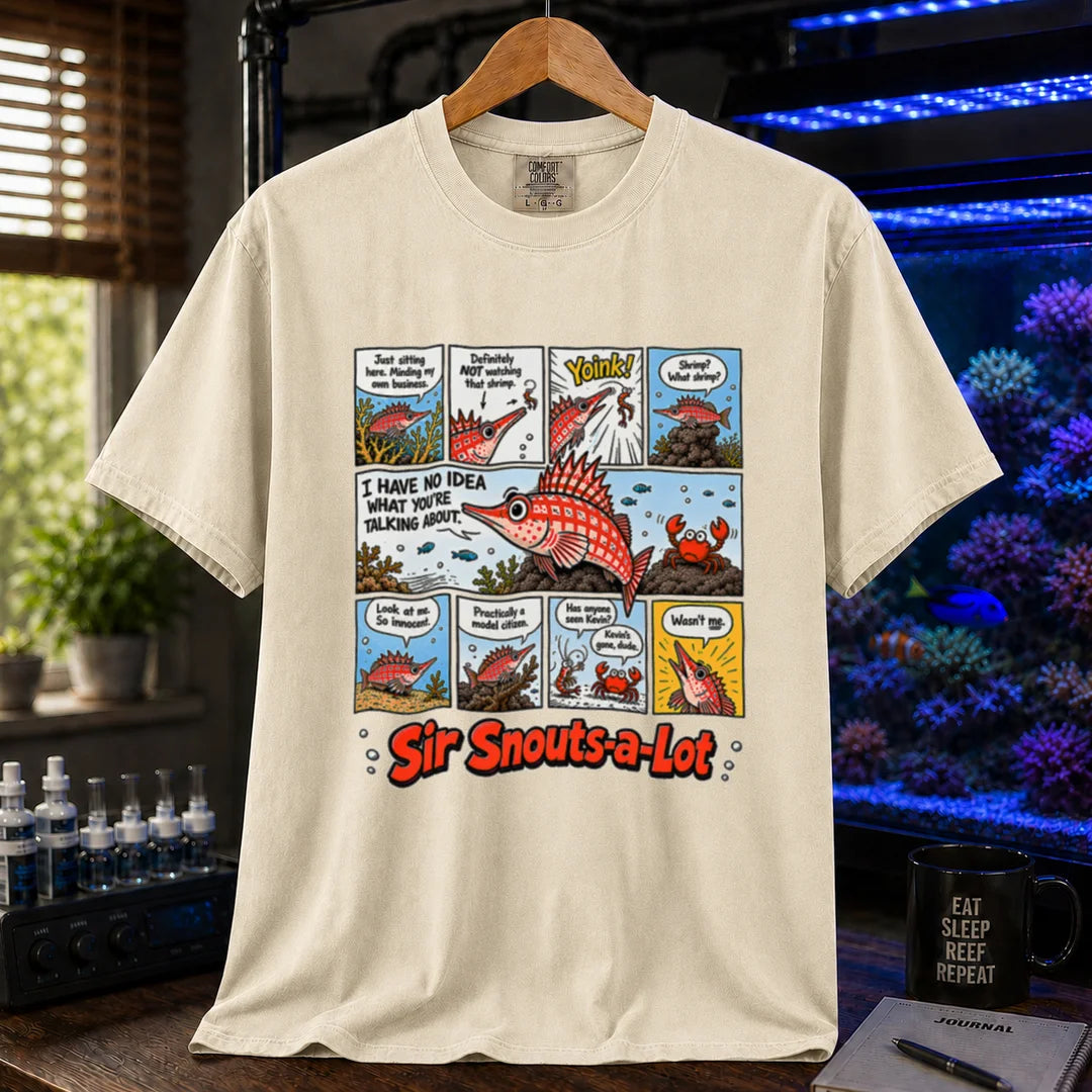 Saltwater aquarium graphic t-shirt featuring a multi-panel comic strip of a longnose hawkfish eating a shrimp with text reading Sir Snouts-a-Lot on a beige, cream, ivory shirt