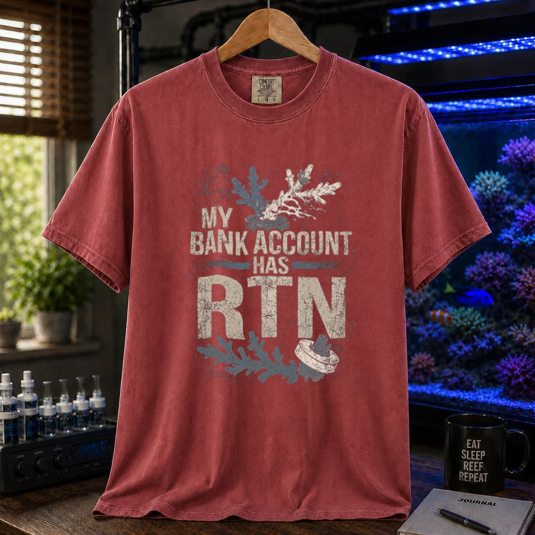 Saltwater aquarium graphic t-shirt featuring distressed typography reading My Bank Account Has RTN alongside dying coral frag illustrations on a maroon, red shirt