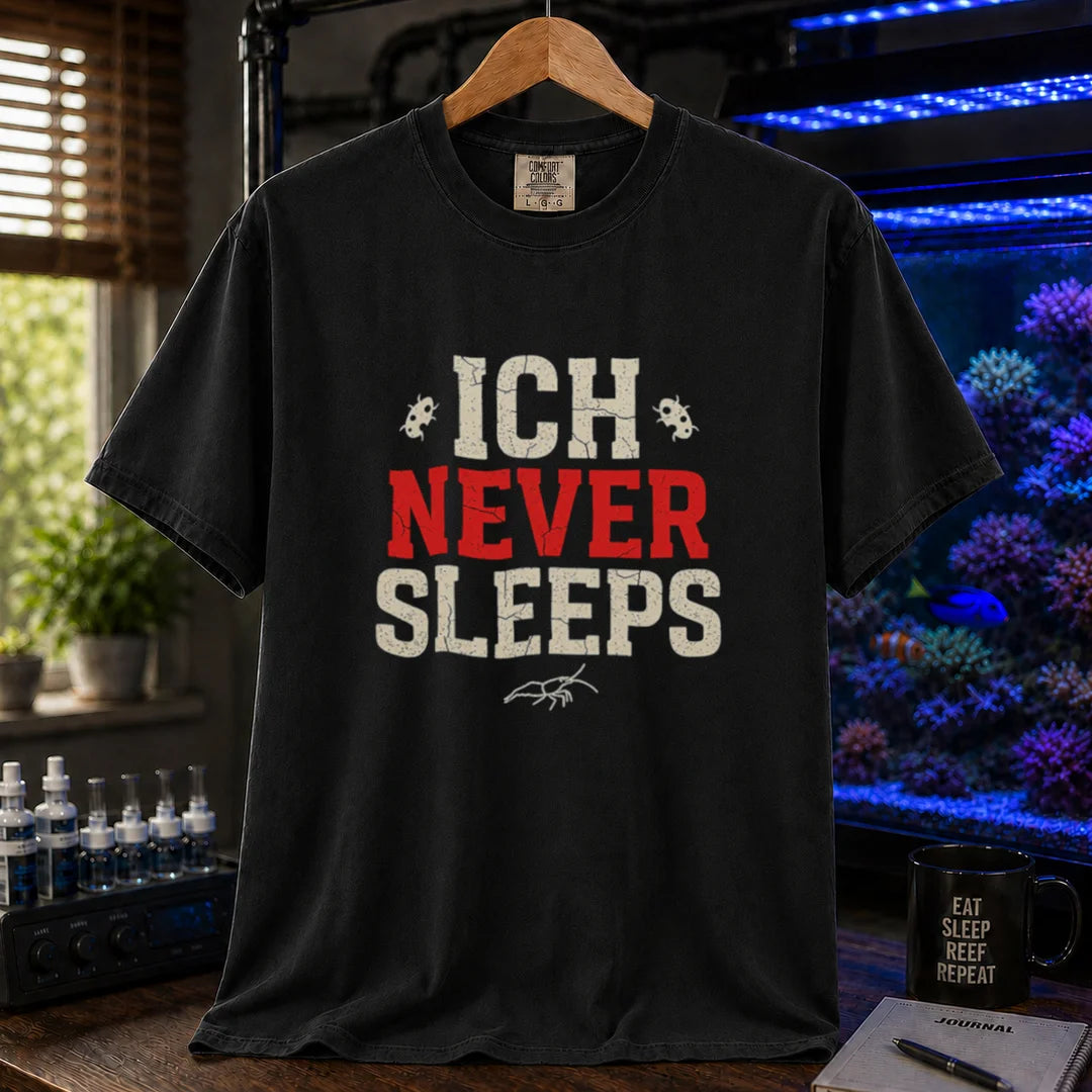 Saltwater aquarium graphic t-shirt featuring distressed typography reading Ich Never Sleeps in white and red with parasite icons on a black shirt