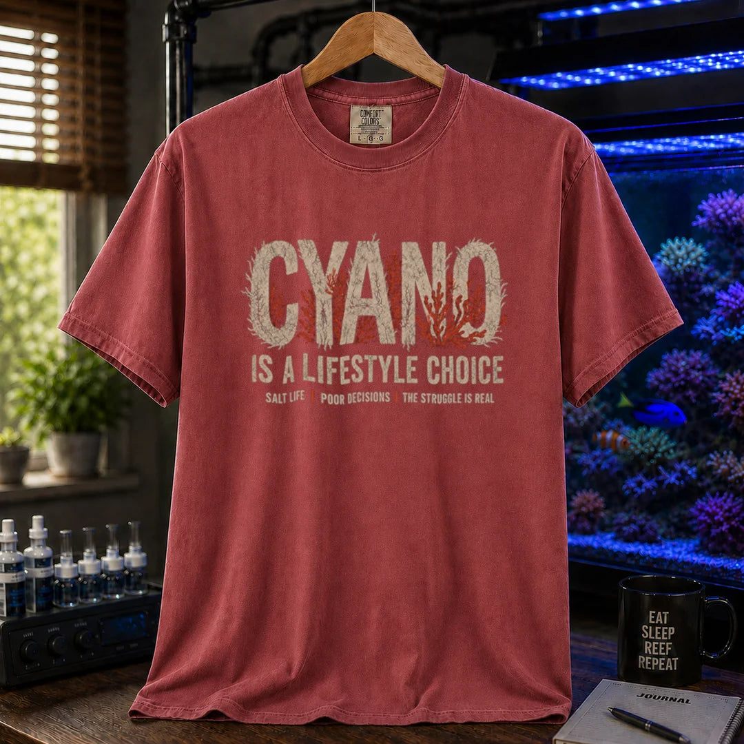 Saltwater aquarium graphic t-shirt featuring distressed typography reading Cyano Is A Lifestyle Choice with red algae details on a maroon, red shirt