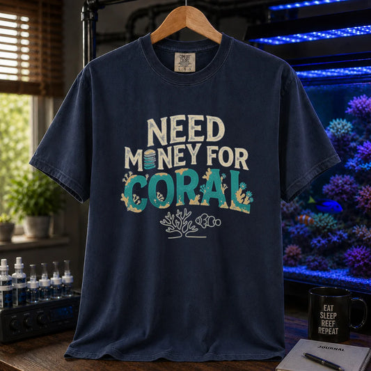 Saltwater aquarium graphic t-shirt featuring distressed typography reading Need Money For Coral with a coin stack and coral-encrusted letters on a navy shirt
