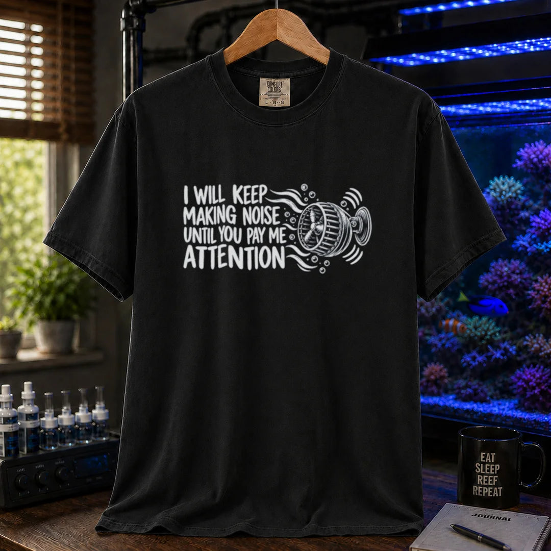 Saltwater aquarium graphic t-shirt featuring distressed typography reading I Will Keep Making Noise Until You Pay Me Attention with an aquarium wavemaker pump illustration on a black shirt