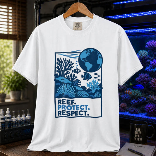 Saltwater aquarium graphic t-shirt featuring a framed blue tonal illustration of a globe, corals, and reef fish with typography reading Reef. Protect. Respect. on a white shirt