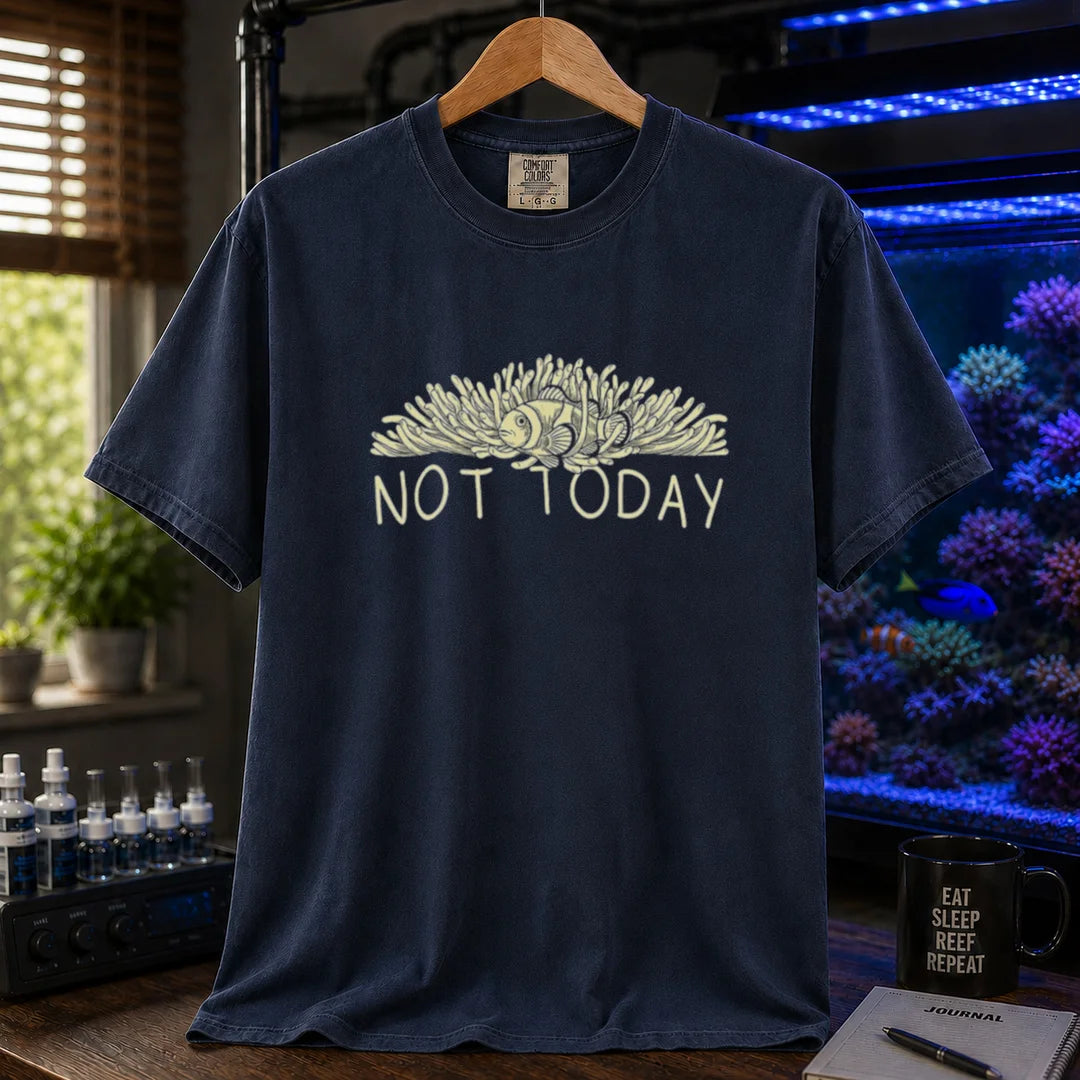 Saltwater aquarium graphic t-shirt featuring an illustration of a clownfish in an anemone with typography reading Not Today in cream on a navy shirt