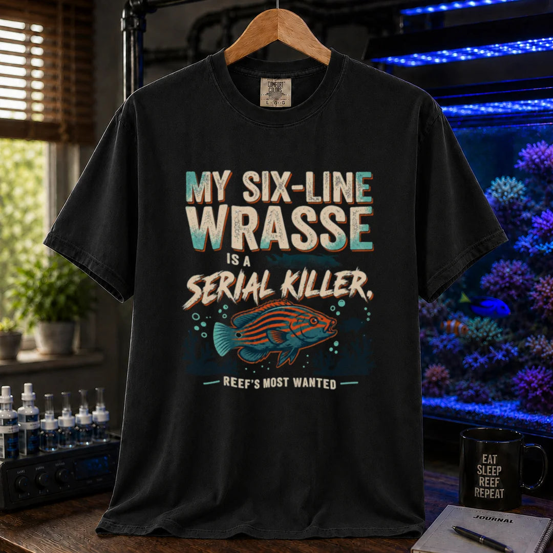 Saltwater aquarium graphic t-shirt featuring distressed typography reading My Six-Line Wrasse Is A Serial Killer with an illustration of a striped wrasse on a black T-Shirt