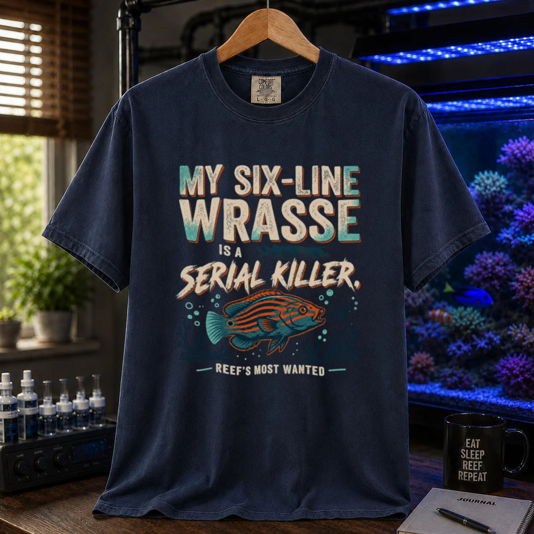 Saltwater aquarium graphic t-shirt featuring distressed typography reading My Six-Line Wrasse Is A Serial Killer with an illustration of a striped wrasse on a navy T-Shirt