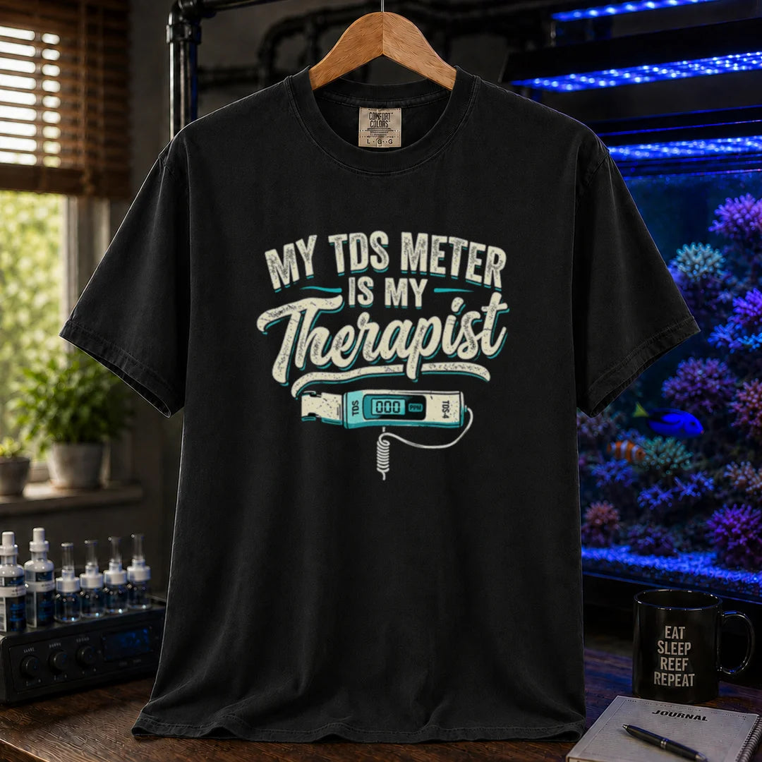 Saltwater aquarium graphic t-shirt featuring distressed typography reading My TDS Meter Is My Therapist with an illustration of a digital TDS meter on a black T-Shirt