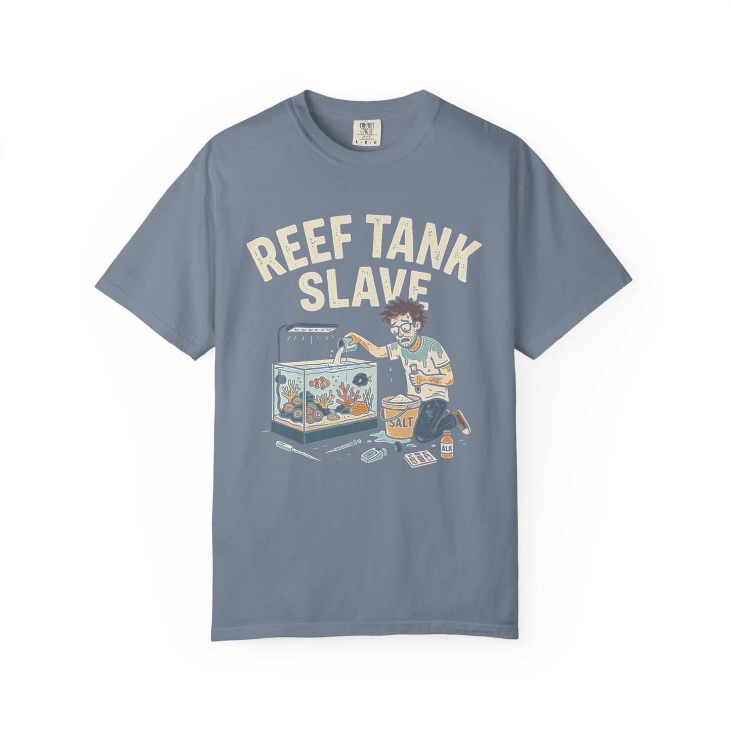 Broke Reefers saltwater aquarium graphic t-shirt featuring a detailed illustration of a reef-keeper mixing salt and maintaining a reef tank with the text: REEF TANK SLAVE, blue crew neck tee