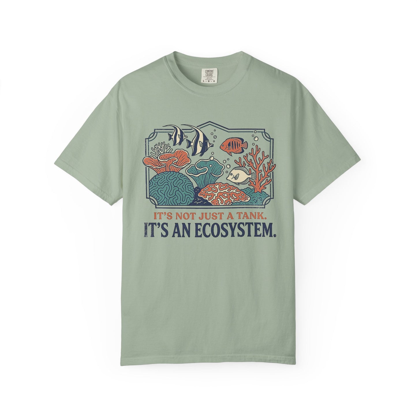 Broke Reefers saltwater aquarium graphic t-shirt featuring a detailed, vintage-style illustration of a thriving reef ecosystem with the text: IT'S NOT JUST A TANK. IT'S AN ECOSYSTEM., light green crew neck tee