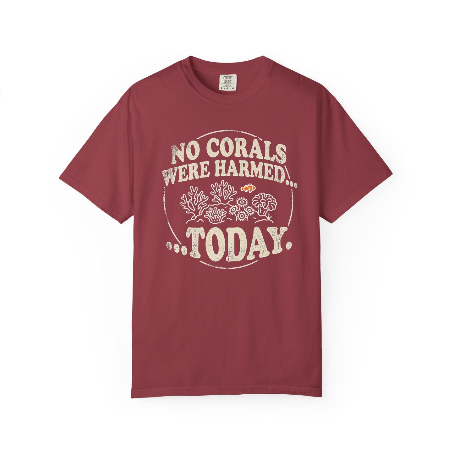 Broke Reefers graphic t-shirt featuring a circular emblem illustration of corals and a clownfish with the text: NO CORALS WERE HARMED... TODAY., maroon crew neck tee
