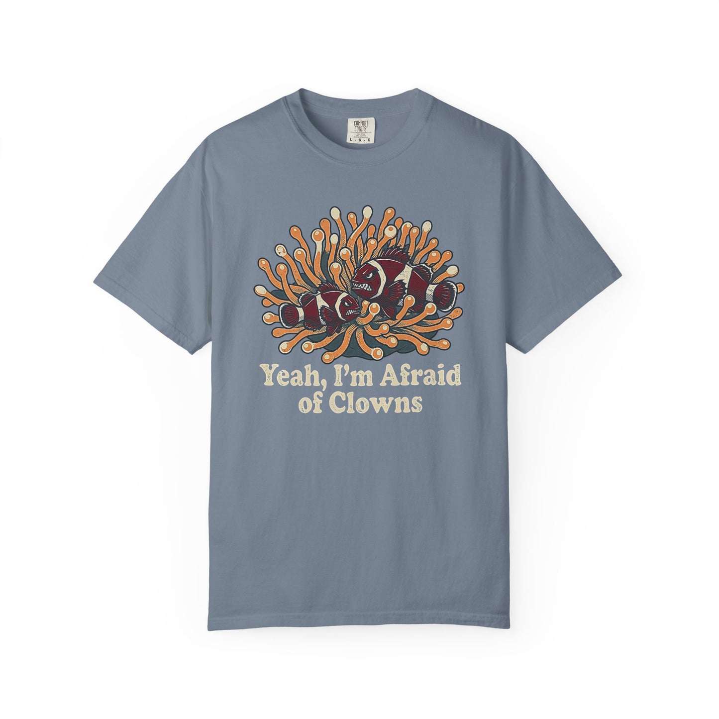 Broke Reefers saltwater aquarium graphic t-shirt featuring a humorous illustration of grumpy clownfish in an anemone with the text: YEAH, I’M AFRAID OF CLOWNS, bluecrew neck tee
