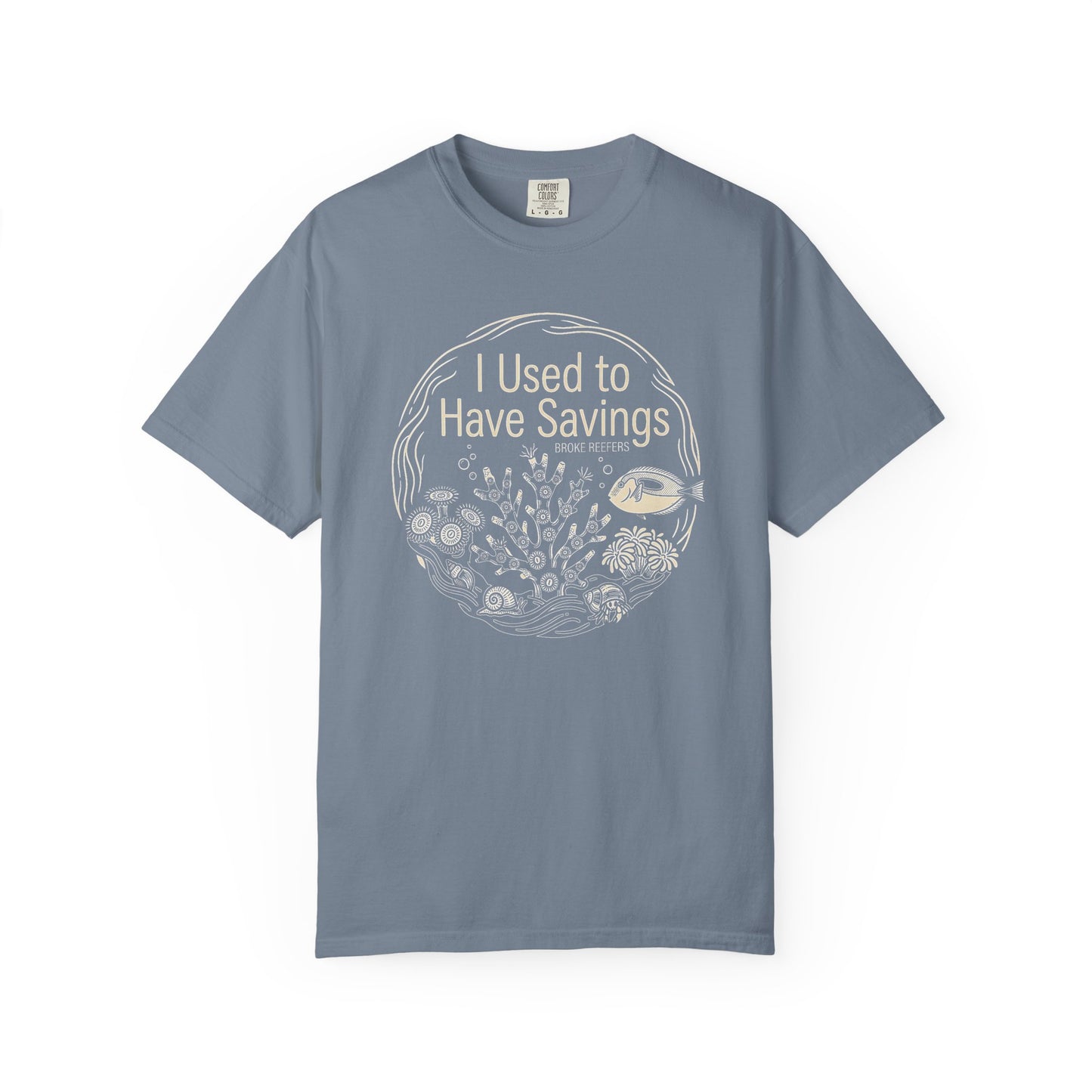Broke Reefers graphic t-shirt featuring a circular line-art illustration of reef life and the text: I USED TO HAVE SAVINGS, blue crew neck tee