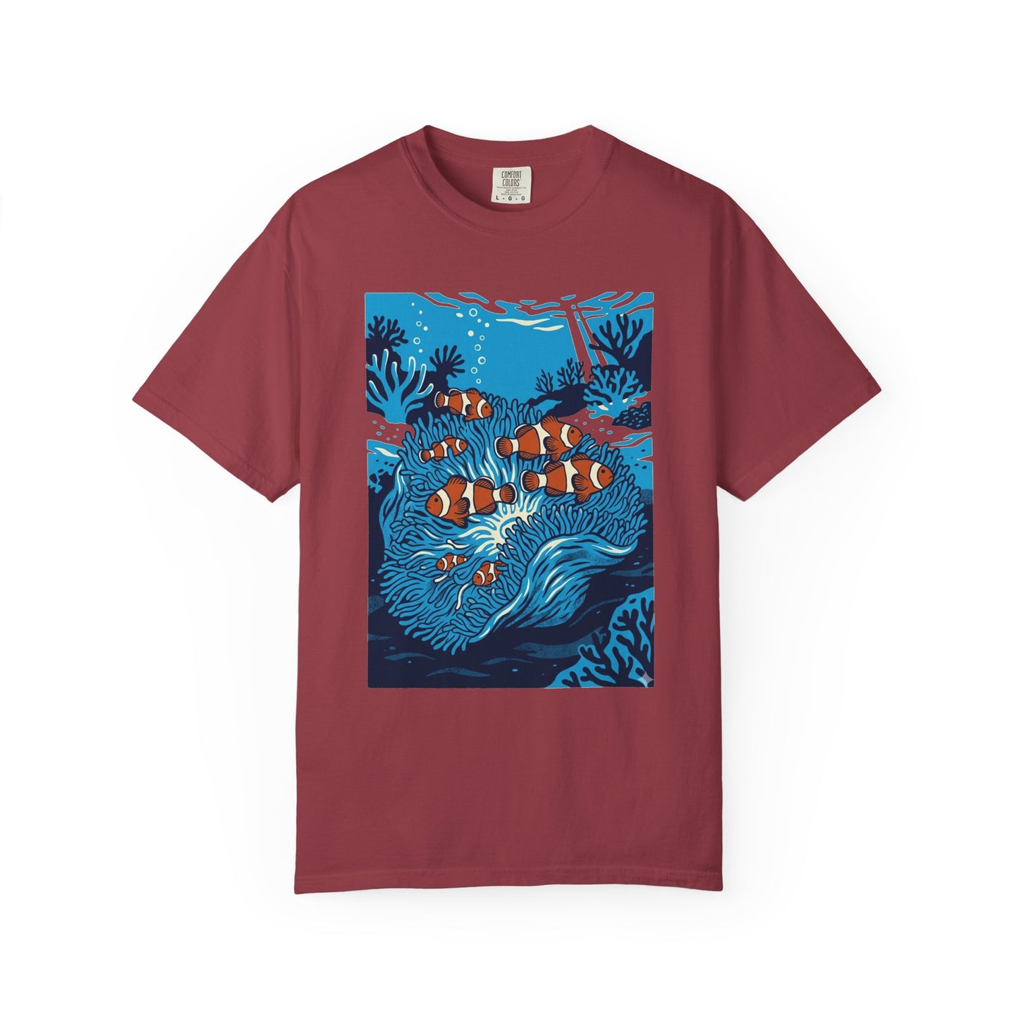 Broke Reefers saltwater aquarium graphic t-shirt featuring a detailed blue-toned illustration of a group of clownfish in an anemone, maroon crew neck tee