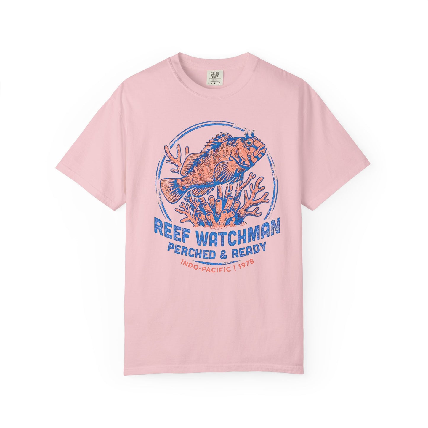 Broke Reefers saltwater aquarium graphic t-shirt featuring a detailed, vintage-style badge illustration of a blenny on coral with the text: REEF WATCHMAN PERCHED & READY INDO-PACIFIC | 1978, pink crew neck tee