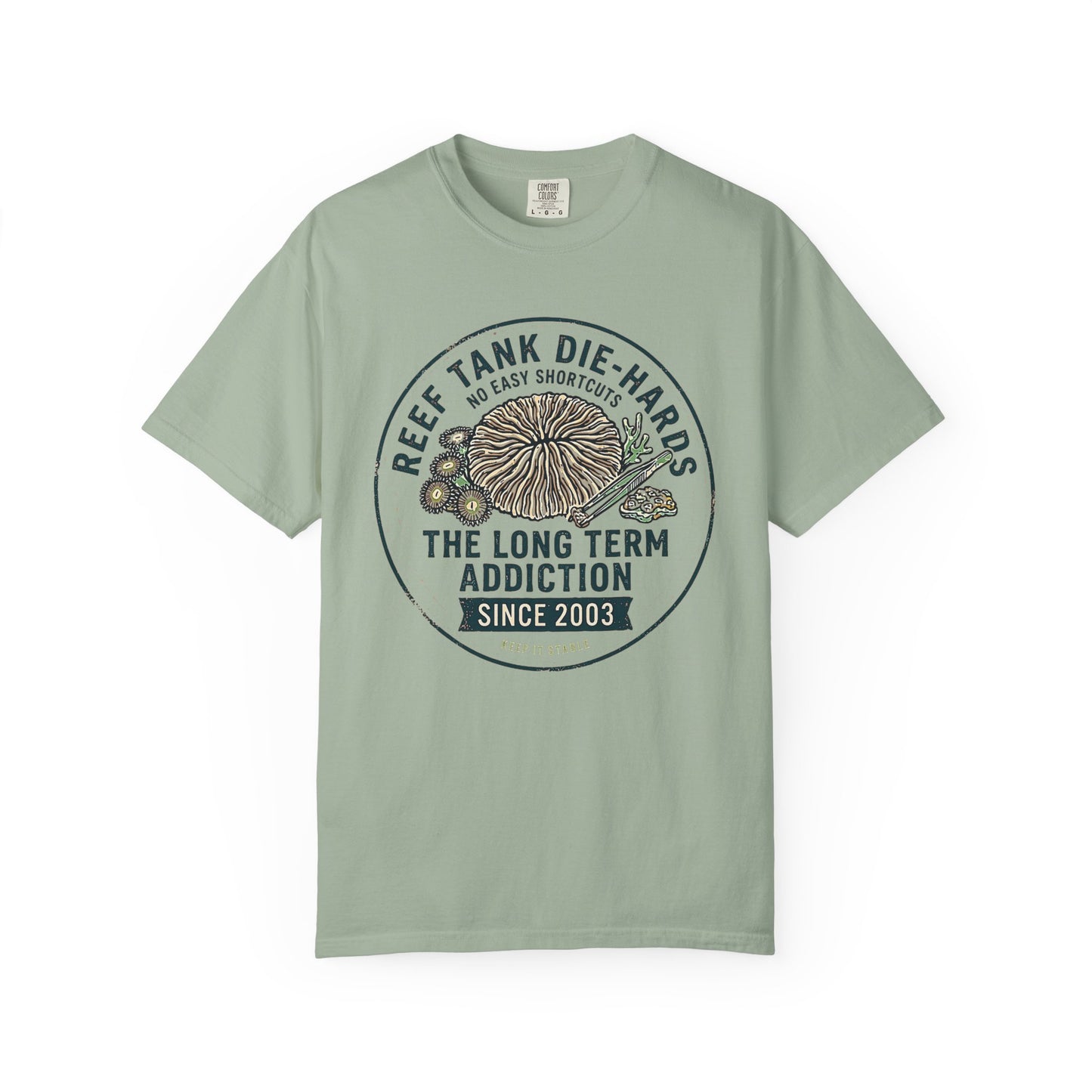 Broke Reefers saltwater aquarium graphic t-shirt featuring a vintage badge illustration of coral and tweezers with the text: REEF TANK DIE-HARDS NO EASY SHORTCUTS THE LONG TERM ADDICTION SINCE 2003 KEEP IT STABLE, light green crew neck tee