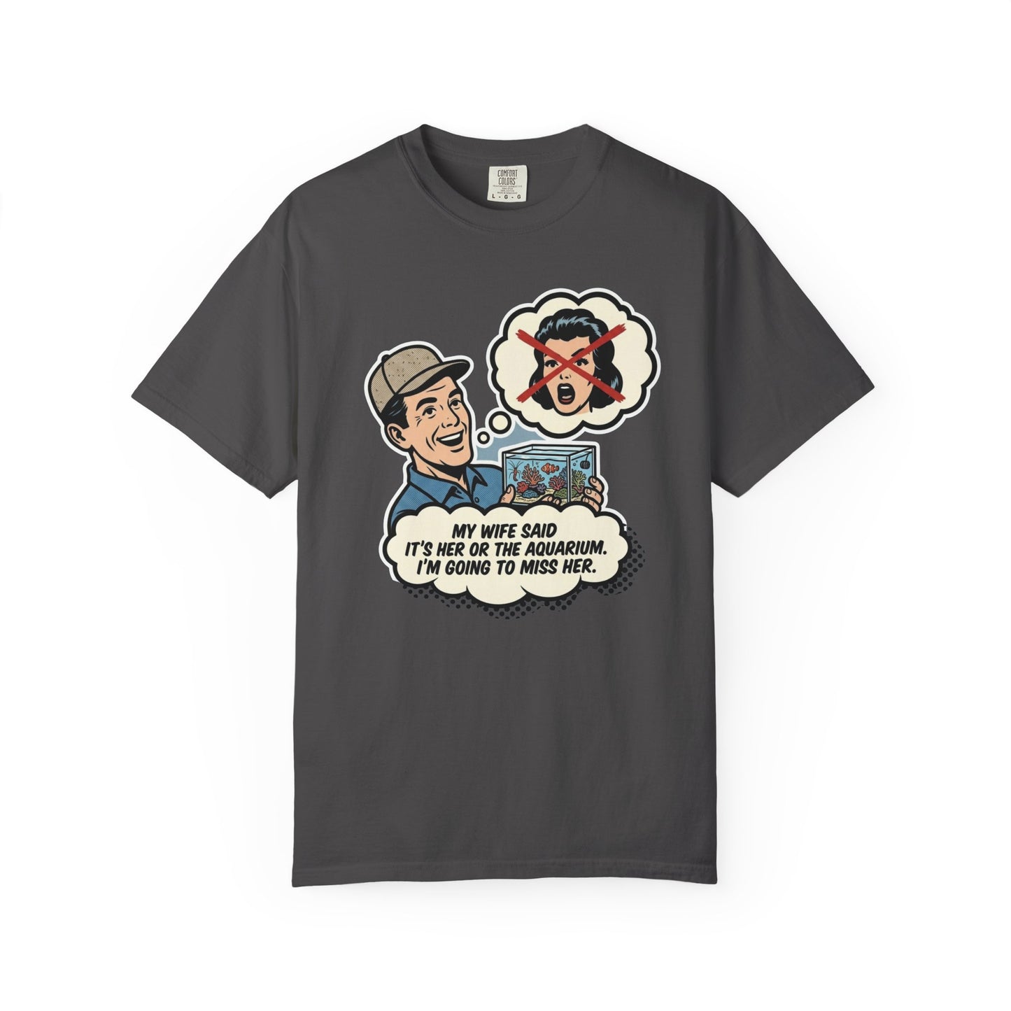 Broke Reefers saltwater aquarium graphic t-shirt featuring a vintage comic-style illustration of a man holding an aquarium with the text: MY WIFE SAID IT'S HER OR THE AQUARIUM. I'M GOING TO MISS HER., dark khaki crew neck tee
