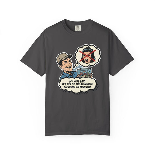Broke Reefers saltwater aquarium graphic t-shirt featuring a vintage comic-style illustration of a man holding an aquarium with the text: MY WIFE SAID IT'S HER OR THE AQUARIUM. I'M GOING TO MISS HER., dark khaki crew neck tee