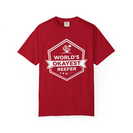 Broke Reefers graphic t-shirt featuring a badge-style illustration with the text: WORLD’S OKAYEST REEFER, red crew neck tee