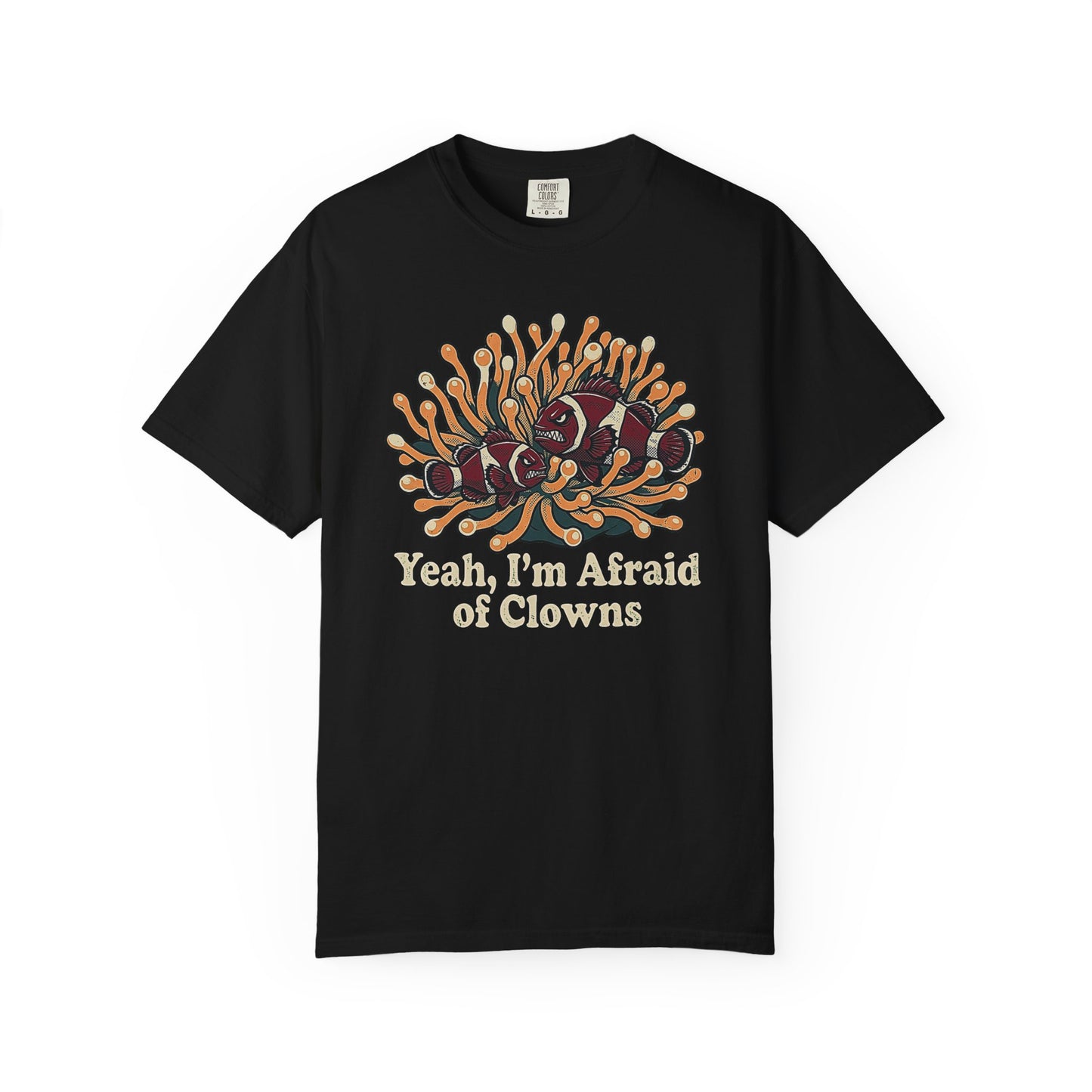 Broke Reefers saltwater aquarium graphic t-shirt featuring a humorous illustration of grumpy clownfish in an anemone with the text: YEAH, I’M AFRAID OF CLOWNS, black crew neck tee