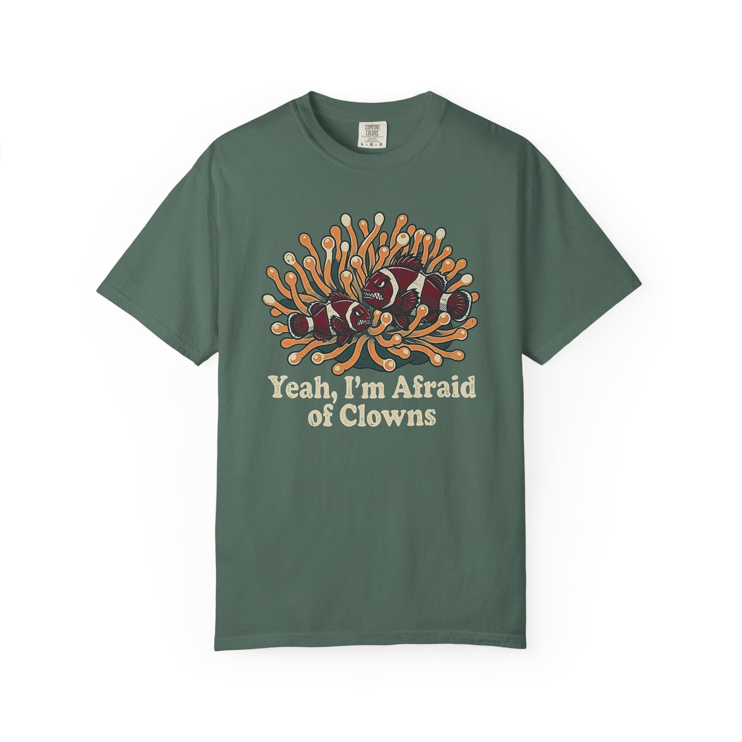 Broke Reefers saltwater aquarium graphic t-shirt featuring a humorous illustration of grumpy clownfish in an anemone with the text: YEAH, I’M AFRAID OF CLOWNS, military green crew neck tee