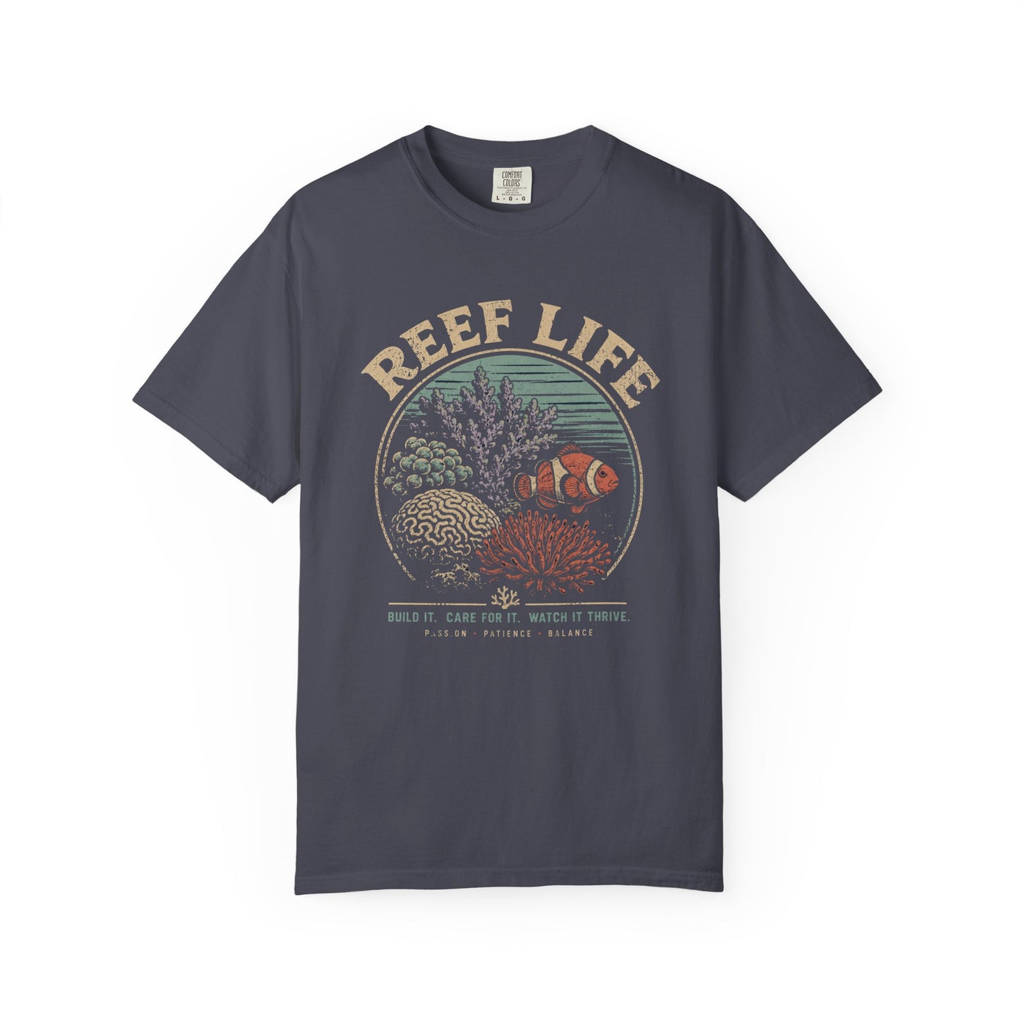 Broke Reefers saltwater aquarium graphic t-shirt featuring a vintage badge illustration of a thriving reef with the text: REEF LIFE. BUILD IT. CARE FOR IT. WATCH IT THRIVE. PASSION, PATIENCE, BALANCE, navy crew neck tee