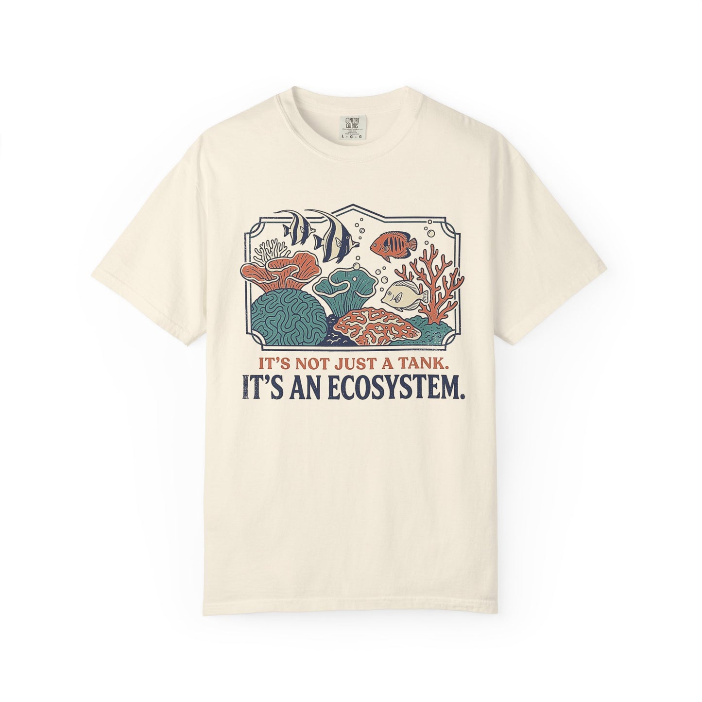 Broke Reefers saltwater aquarium graphic t-shirt featuring a detailed, vintage-style illustration of a thriving reef ecosystem with the text: IT'S NOT JUST A TANK. IT'S AN ECOSYSTEM., beige cream crew neck tee