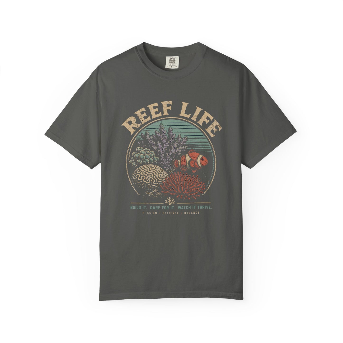 Broke Reefers saltwater aquarium graphic t-shirt featuring a vintage badge illustration of a thriving reef with the text: REEF LIFE. BUILD IT. CARE FOR IT. WATCH IT THRIVE. PASSION, PATIENCE, BALANCE, dark khaki crew neck tee