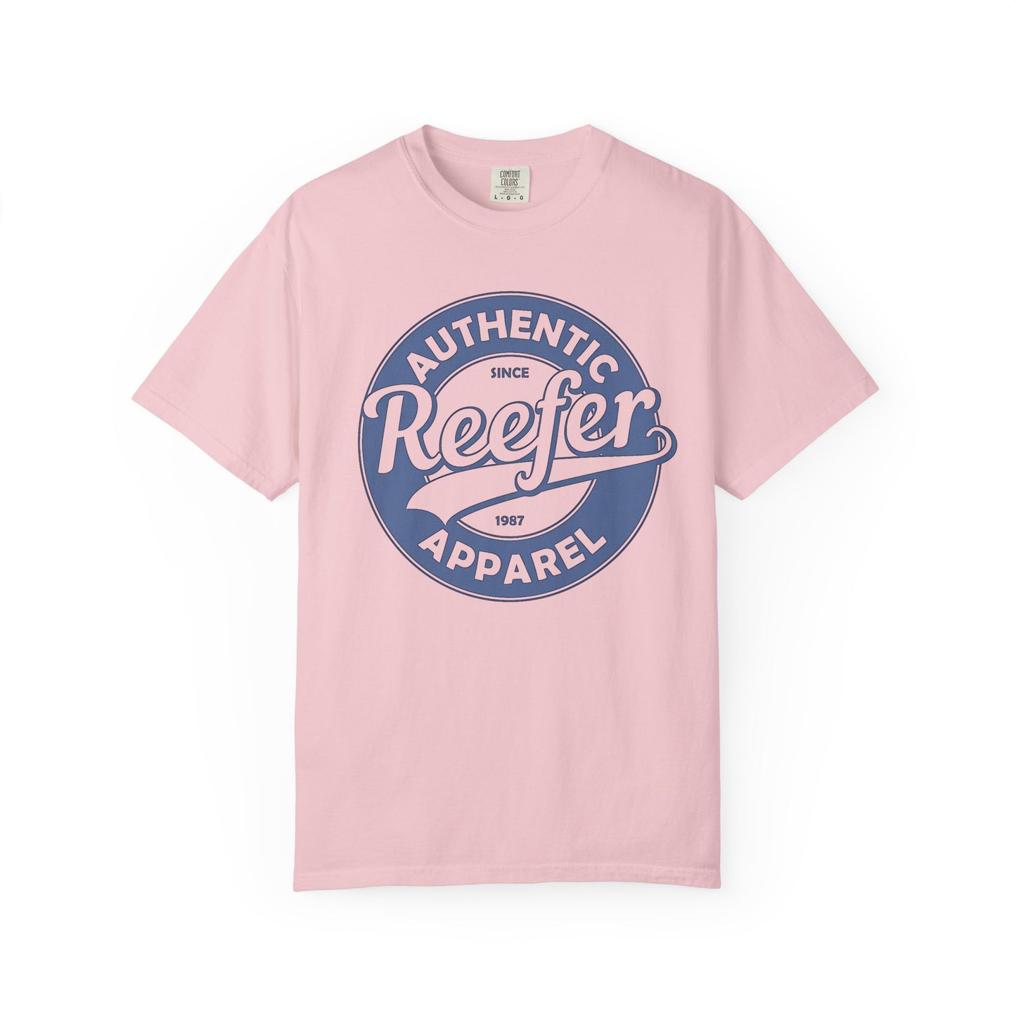 Vintage-inspired graphic t-shirt featuring a circular badge design that reads: AUTHENTIC REEFER APPAREL SINCE 1987, pink crew neck tee