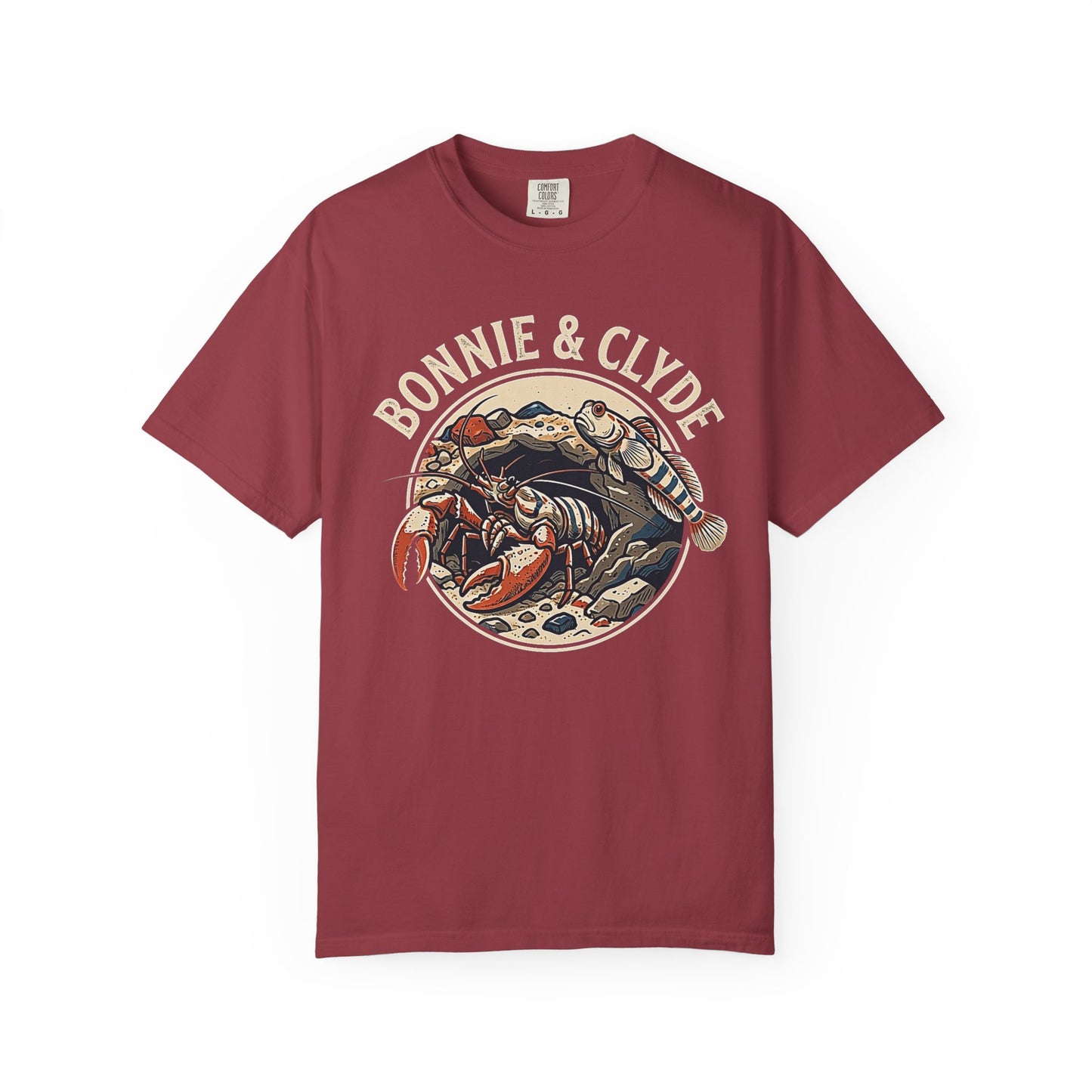 Broke Reefers saltwater aquarium graphic t-shirt featuring a circular badge illustration of a pistol shrimp and a goby with the text: BONNIE & CLYDE, maroon crew neck tee