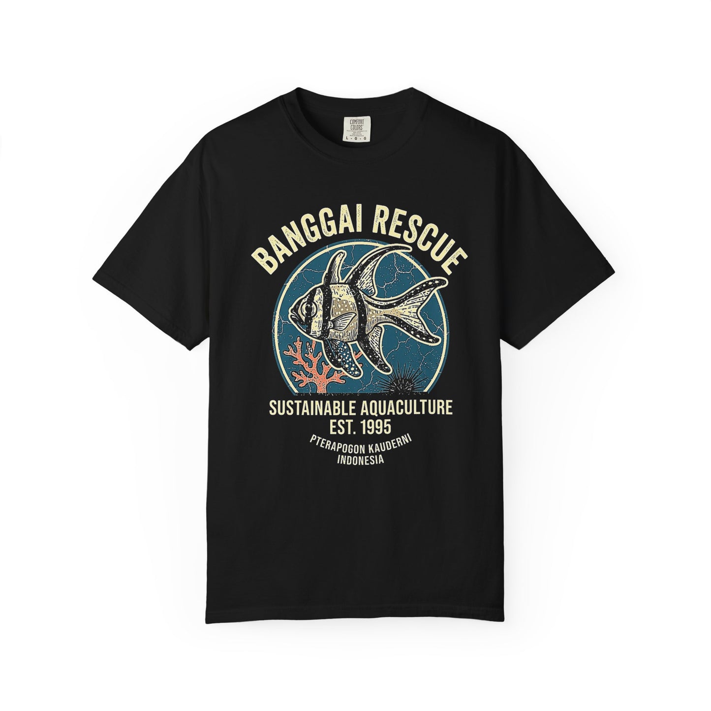 Broke Reefers saltwater aquarium graphic t-shirt featuring a detailed, vintage-style badge illustration of a Banggai Cardinalfish with the text: BANGGAI RESCUE SUSTAINABLE AQUACULTURE EST. 1995 PTERAPOGON KAUDERNI INDONESIA, black crew neck tee