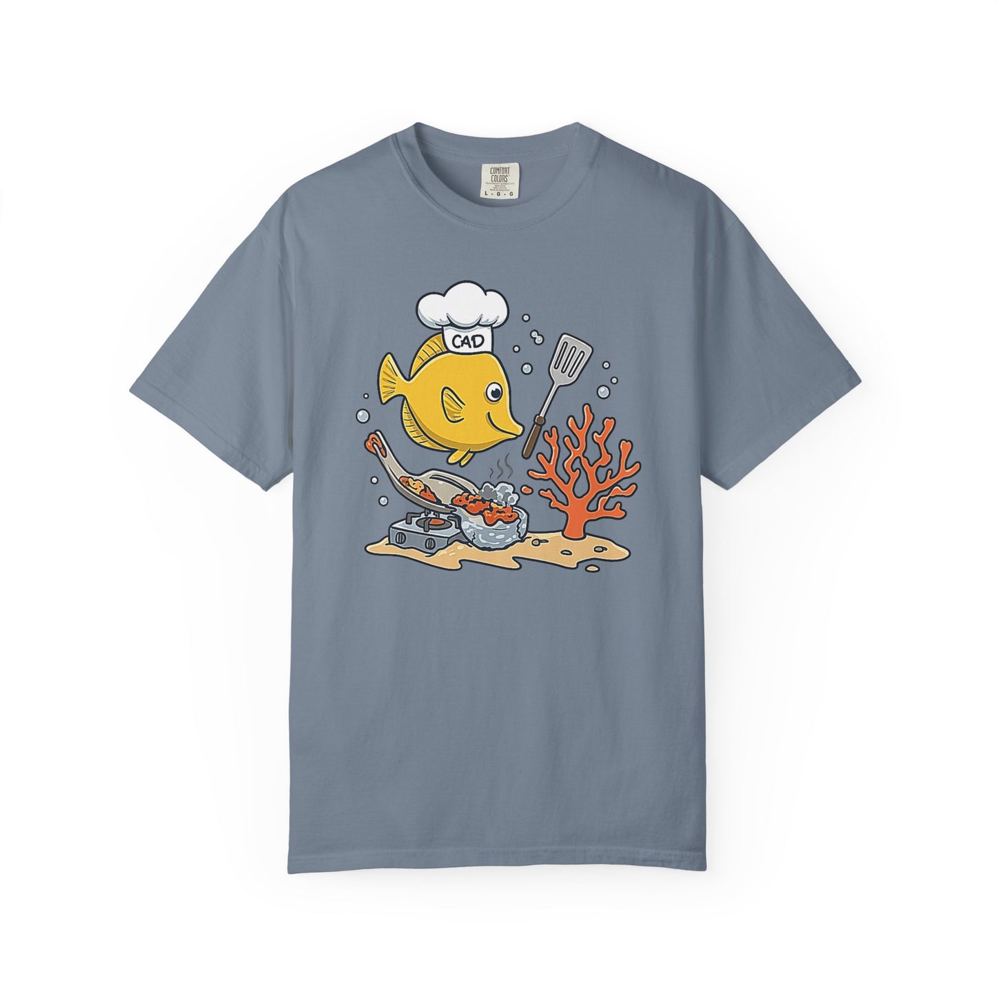 Broke Reefers saltwater aquarium graphic t-shirt featuring a cartoon illustration of a Yellow Tang wearing a chef hat labeled 'CAD' and cooking fish food, blue crew neck tee