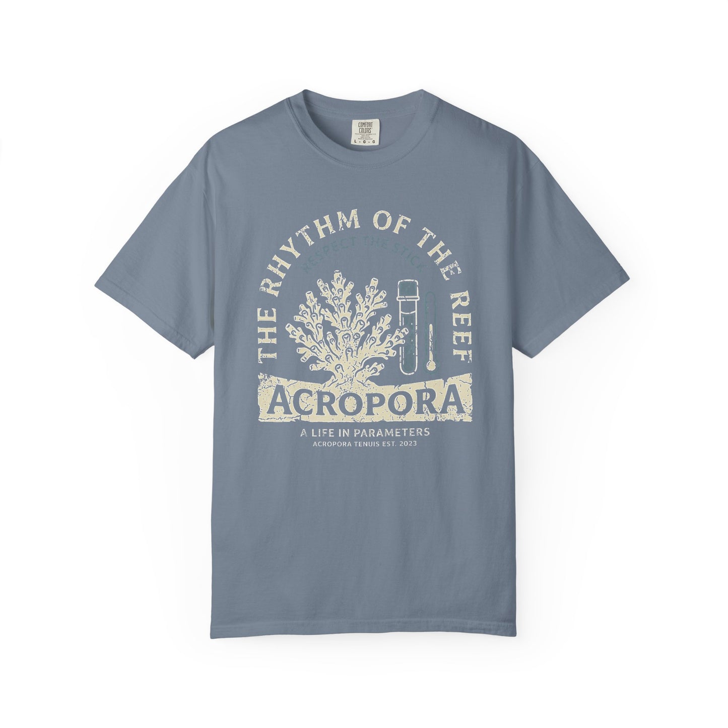 Broke Reefers graphic t-shirt featuring an illustration of an Acropora coral colony and testing tools with the text: THE RHYTHM OF THE REEF, ACROPORA, A LIFE IN PARAMETERS, blue crew neck tee