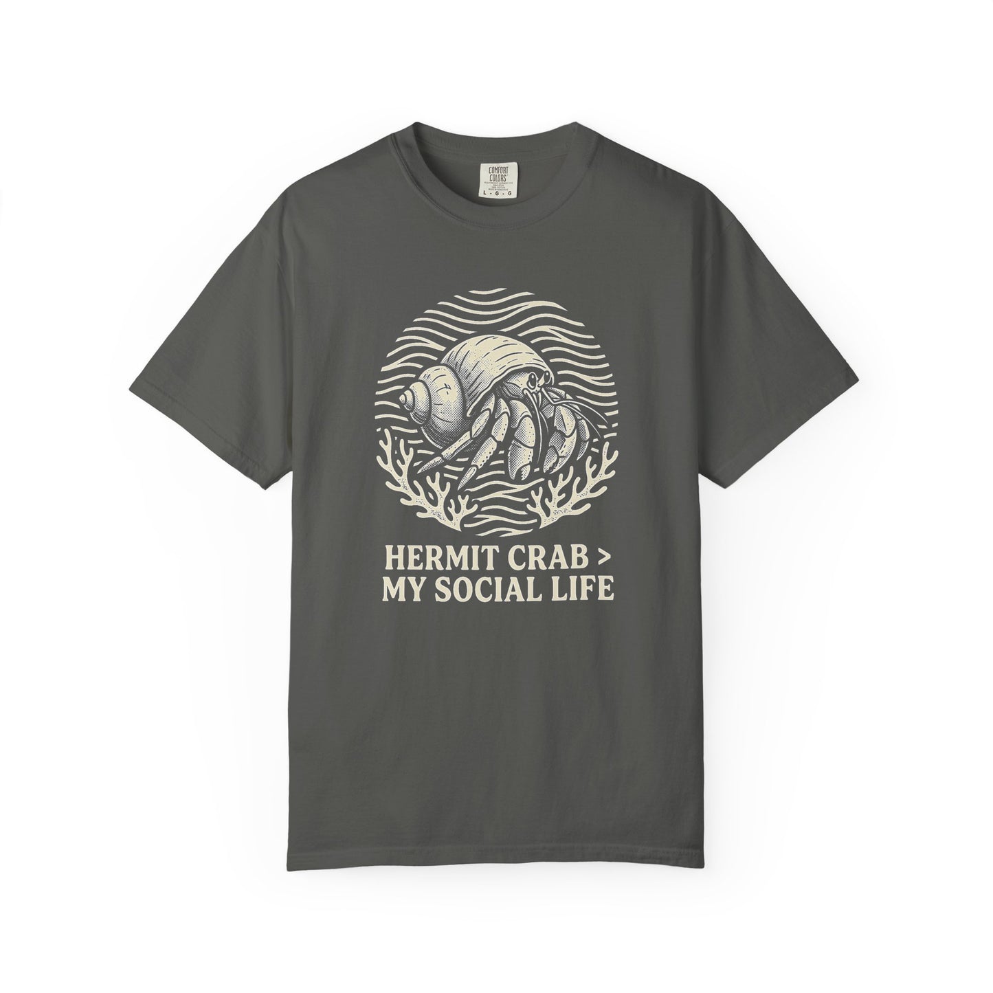 Broke Reefers saltwater aquarium graphic t-shirt featuring a badge illustration of a hermit crab with the text: HERMIT CRAB > MY SOCIAL LIFE, dark khaki crew neck tee