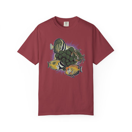 Broke Reefers graphic t-shirt featuring a vibrant illustration of a crab and various fish surrounding a cluster of bubble algae, maroon crew neck tee