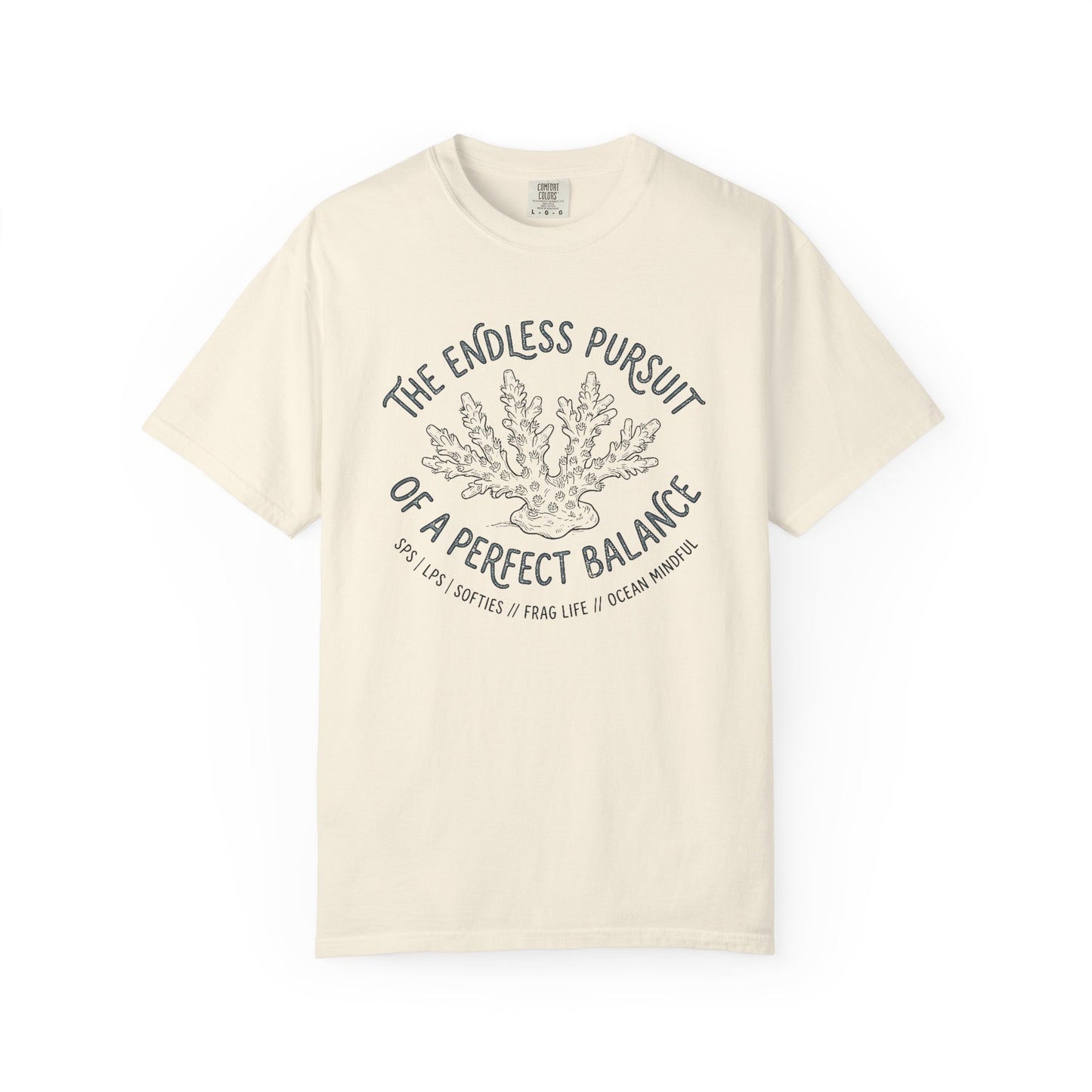Broke Reefers saltwater aquarium graphic t-shirt featuring an etched-style coral illustration with text: THE ENDLESS PURSUIT OF A PERFECT BALANCE, SPS | LPS | SOFTIES // FRAG LIFE // OCEAN MINDFUL, beige cream crew neck tee