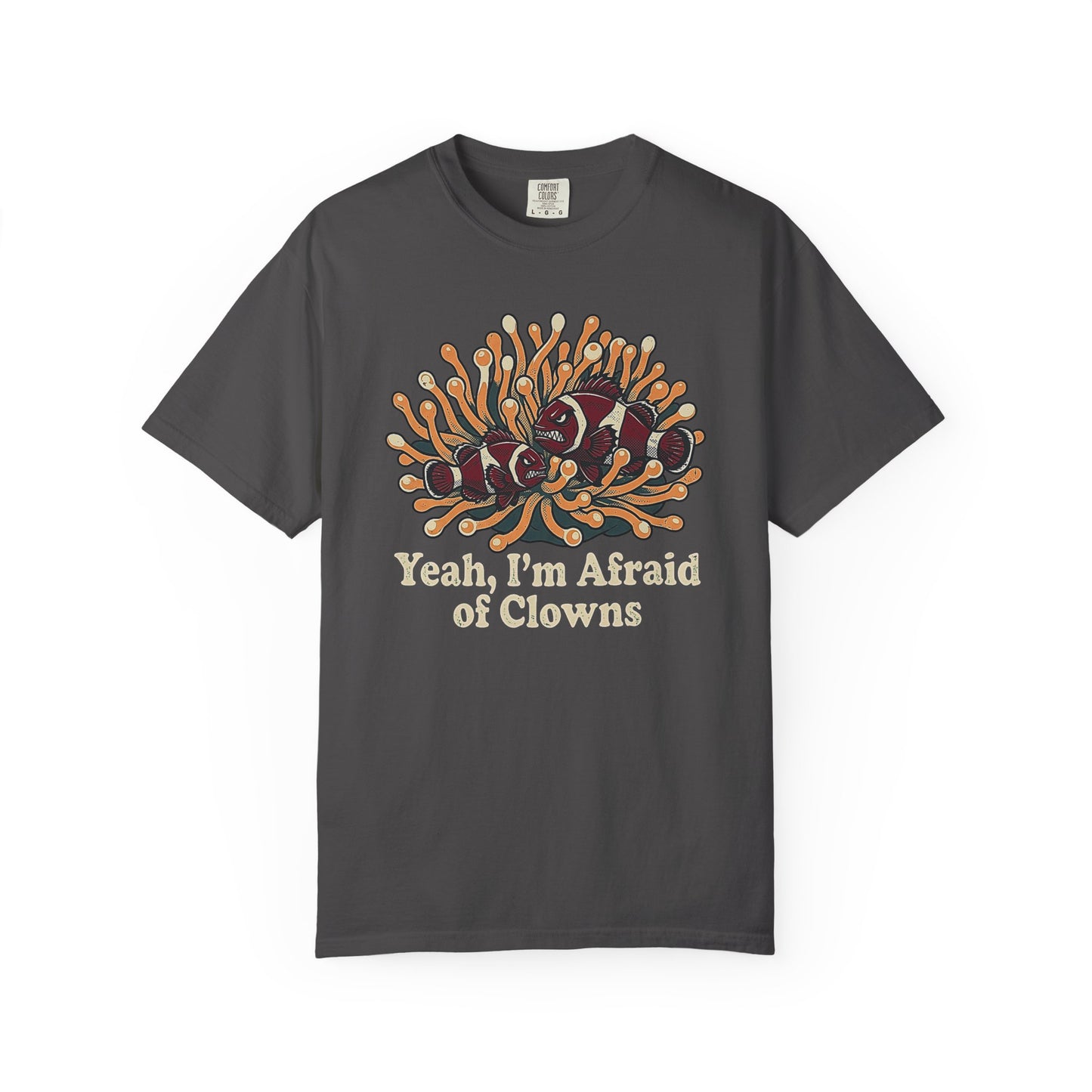 Broke Reefers saltwater aquarium graphic t-shirt featuring a humorous illustration of grumpy clownfish in an anemone with the text: YEAH, I’M AFRAID OF CLOWNS, dark khaki crew neck tee