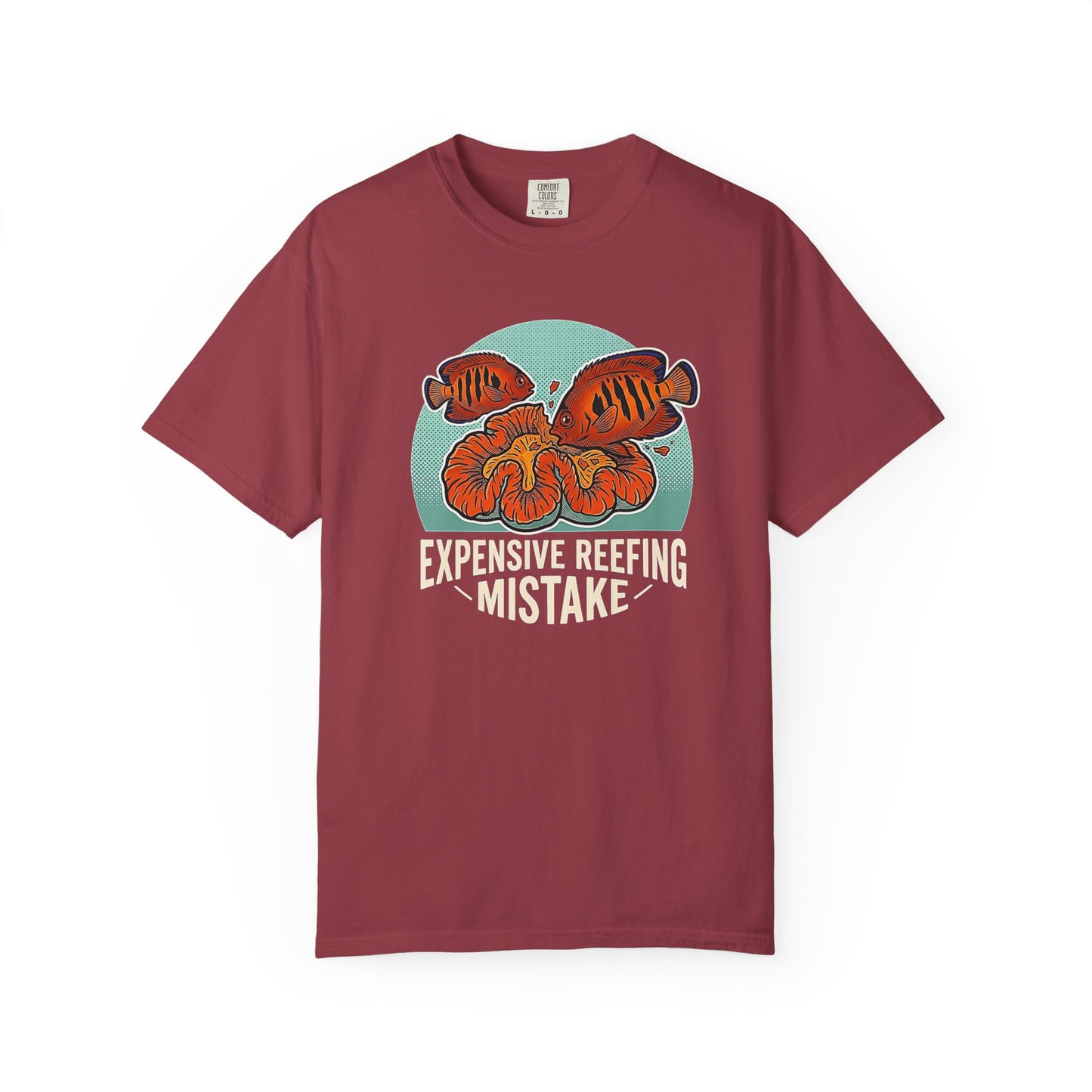 Broke Reefers graphic t-shirt featuring an illustration of a fish eating coral with the text: EXPENSIVE REEFING MISTAKE, maroon crew neck tee
