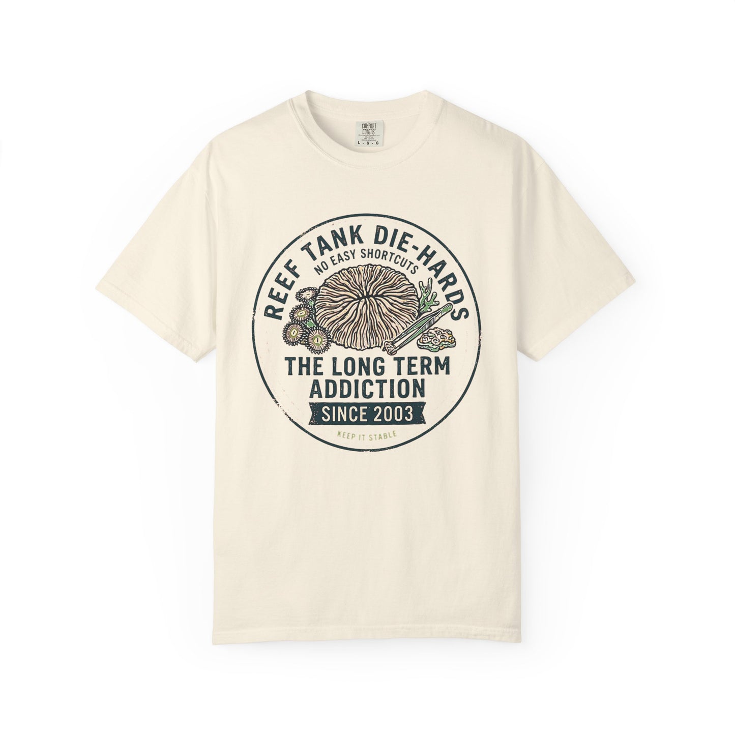 Broke Reefers saltwater aquarium graphic t-shirt featuring a vintage badge illustration of coral and tweezers with the text: REEF TANK DIE-HARDS NO EASY SHORTCUTS THE LONG TERM ADDICTION SINCE 2003 KEEP IT STABLE, beige cream crew neck tee