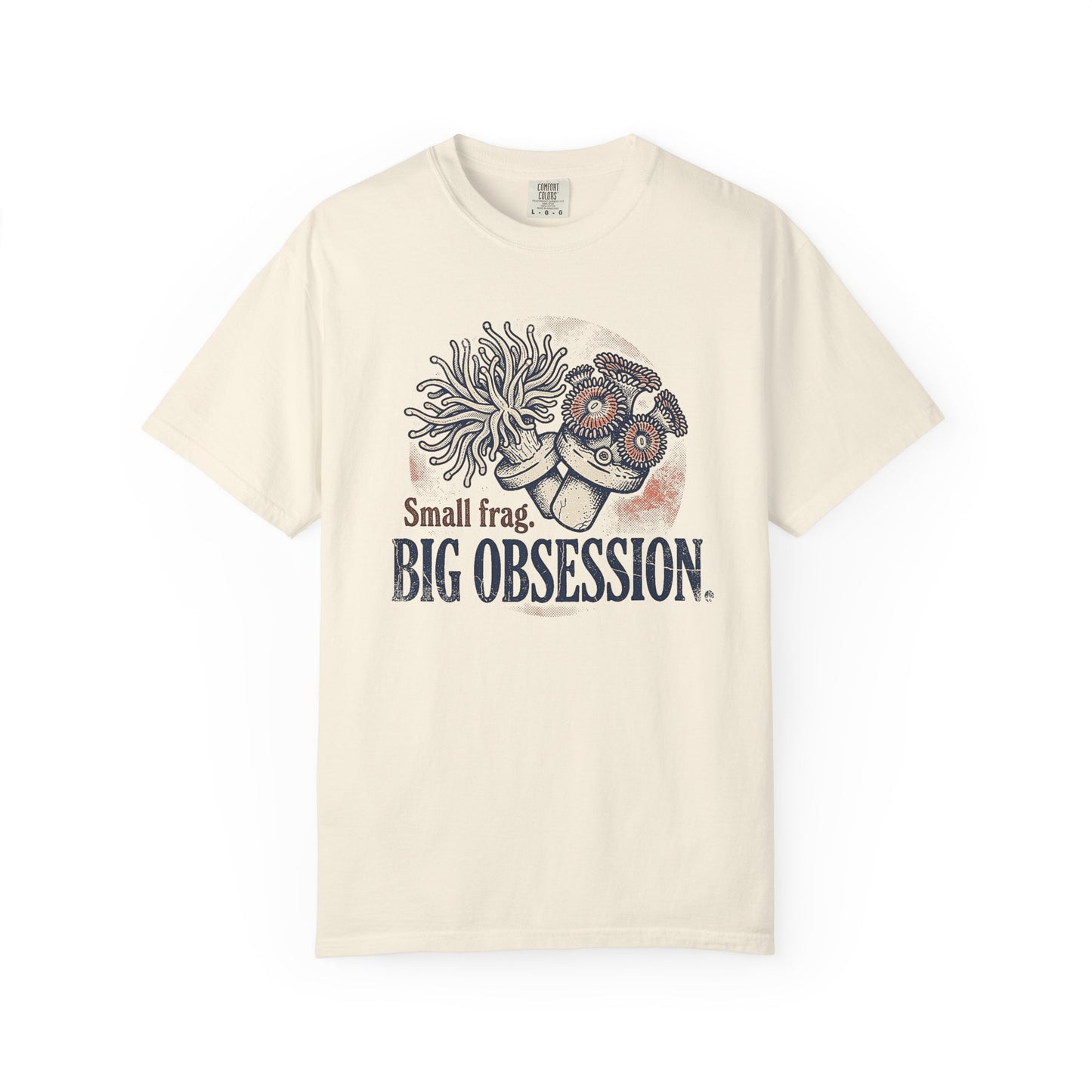 Broke Reefers saltwater aquarium graphic t-shirt featuring a detailed illustration of coral frags with the text: Small frag. BIG OBSESSION., beige cream crew neck tee
