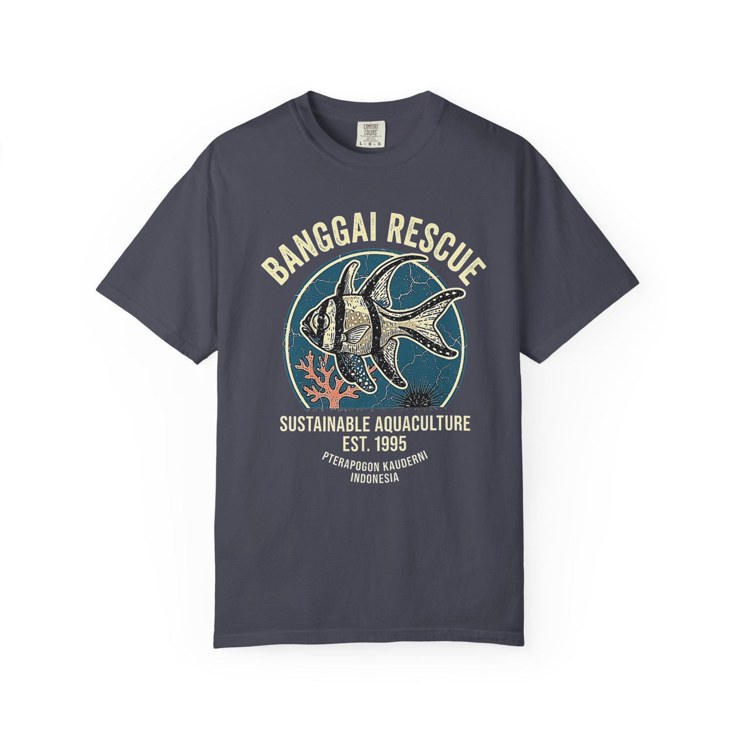 Broke Reefers saltwater aquarium graphic t-shirt featuring a detailed, vintage-style badge illustration of a Banggai Cardinalfish with the text: BANGGAI RESCUE SUSTAINABLE AQUACULTURE EST. 1995 PTERAPOGON KAUDERNI INDONESIA, navy crew neck tee