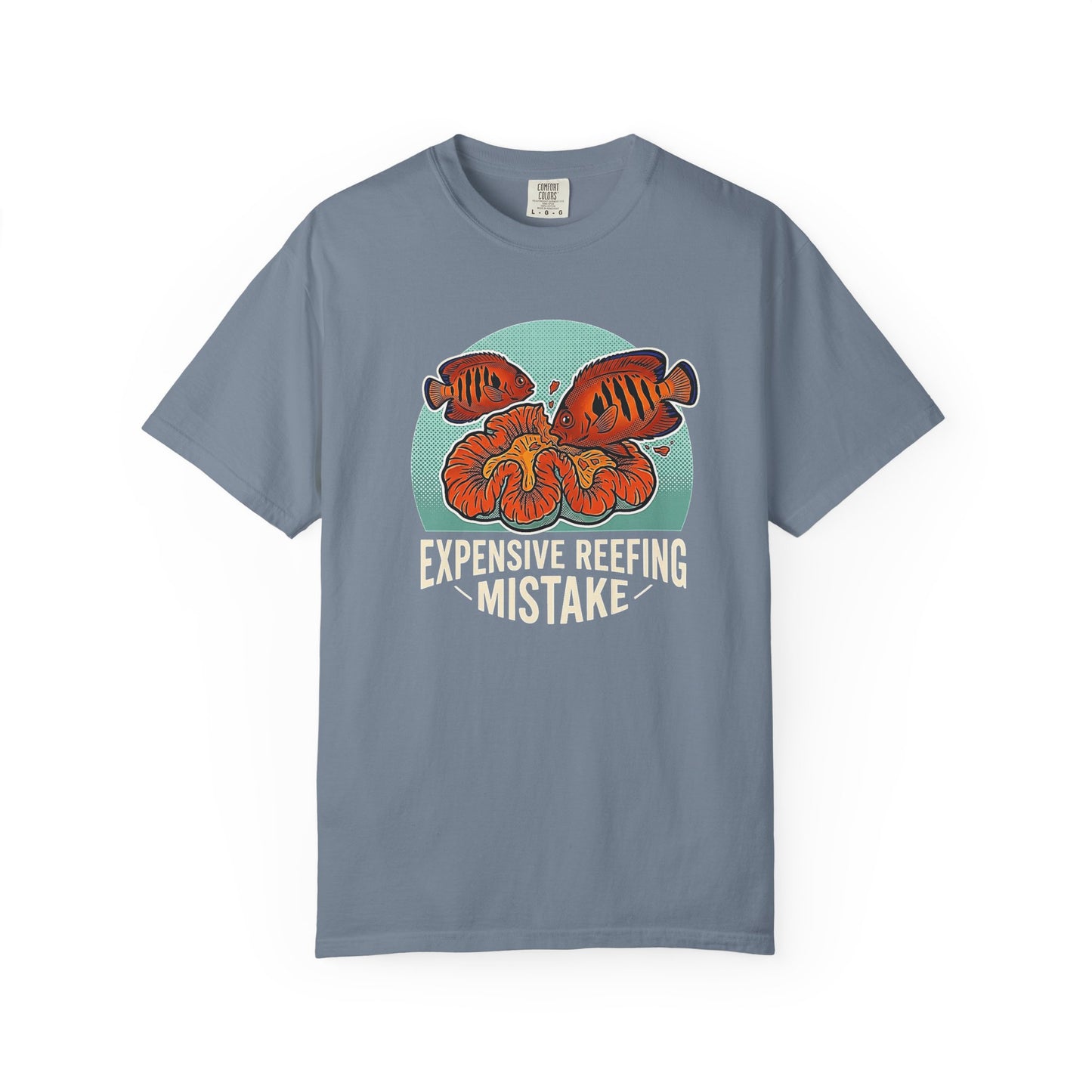 Broke Reefers graphic t-shirt featuring an illustration of a fish eating coral with the text: EXPENSIVE REEFING MISTAKE, blue crew neck tee