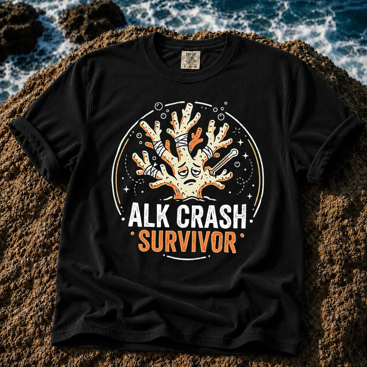 Broke Reefers saltwater aquarium graphic t-shirt featuring an expressive, bandaged coral illustration with the text: ALK CRASH SURVIVOR, black crew neck tee